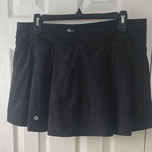 Lululemon Black Pace Rival  Skirt with Pleats, Shorts, and Pockets.